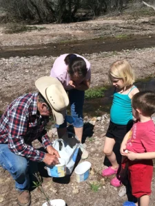 children making plaster casts.